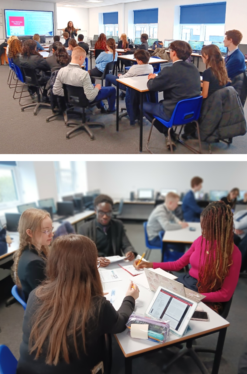 A group of people sitting at tables in a classroom

Description automatically generated