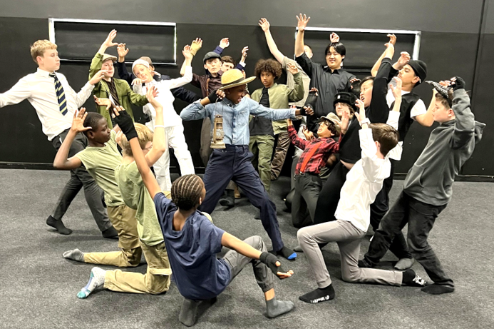 A group of people posing for a photo

AI-generated content may be incorrect.