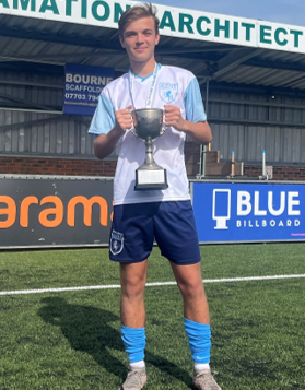 A person holding a trophy

AI-generated content may be incorrect.