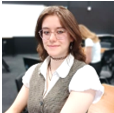A person wearing glasses and a vest

AI-generated content may be incorrect.