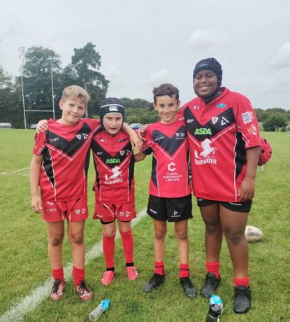 A group of boys wearing sports uniforms

AI-generated content may be incorrect.