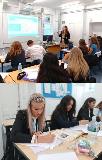 A group of people sitting at tables in a classroom

AI-generated content may be incorrect.