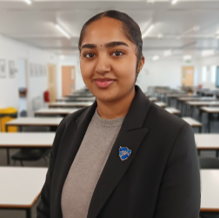 A person in a classroom

AI-generated content may be incorrect.