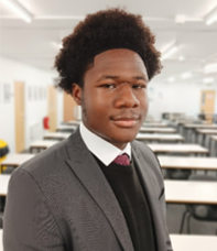 A person in a suit and tie

AI-generated content may be incorrect.